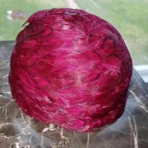 Pink feathered bun cover